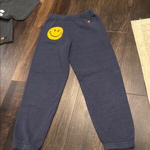 Aviator Nation Blue and Yellow Joggers with Smiley Design. Size 10 Kids.